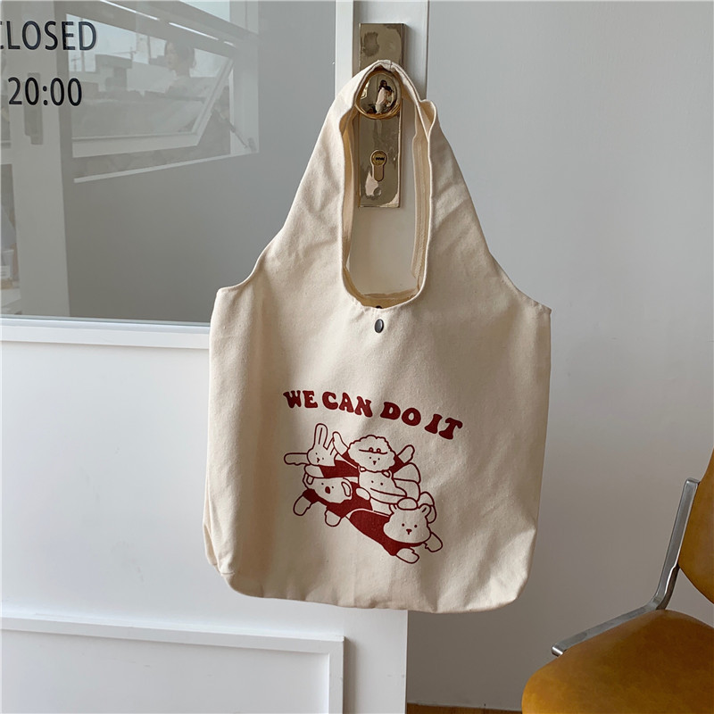 15134 canvas bag for women, Korean version, large-capacity underarm single-shoulder bag, simple and cute cartoon student handbag wholesale Item Picture
