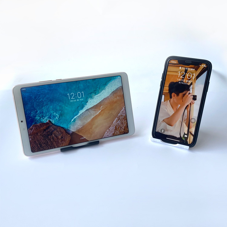 New desktop folding multi-functional stand for lazy people, suitable for mobile phones and tablets. 360° rotatable gift with LOGO printing function Application Scenario