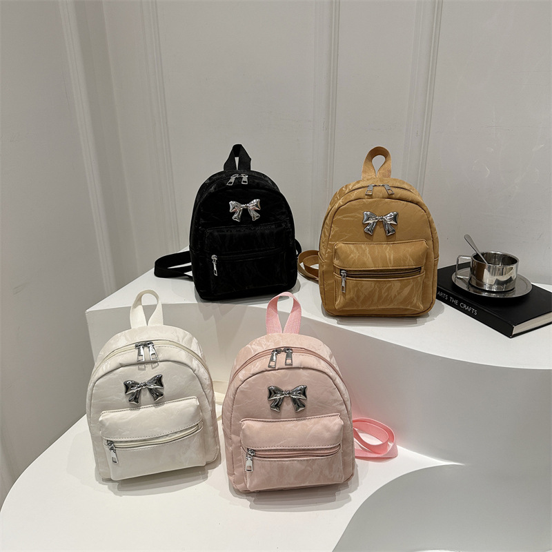Bow backpack for women, a niche, casual and fashionable Korean girl bucket bag, a lightweight and small hand-held shoulder bag Application Scenario