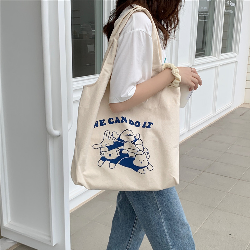 15134 canvas bag for women, Korean version, large-capacity underarm single-shoulder bag, simple and cute cartoon student handbag wholesale full figure
