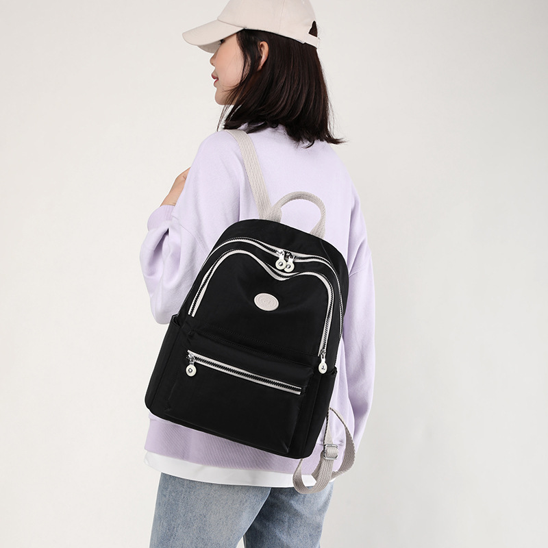 Colorful Fox's new women's backpack, large-capacity water-resistant travel backpack, and fashionable color-blocking campus schoolbag details Picture