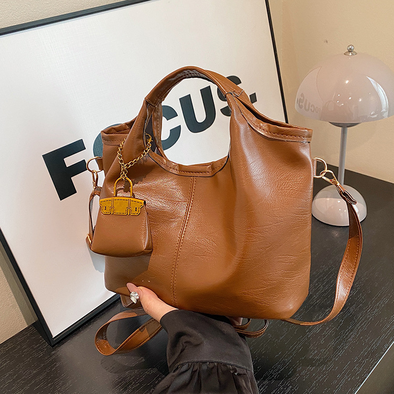 Autumn and winter retro fashion women's 2024 new large-capacity casual commuting solid-color mother-and-child hand-held crossbody tote bag full figure