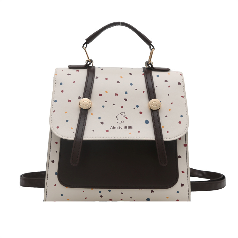 A new 2025 fashionable, retro, simple and stylish polka dot texture, large-capacity, college-style simple backpack for women's commuting Item Picture