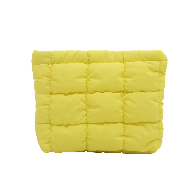 A simple and trendy embroidered checkered 2025 new solid-color makeup bag, a casual, high-end and niche InS-style hand-held bag Item Picture