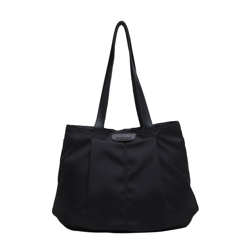 The new solid-color simple, fashionable, casual and comfortable tote bag is a versatile and stylish single-shoulder bag with a good texture for going out Item Picture