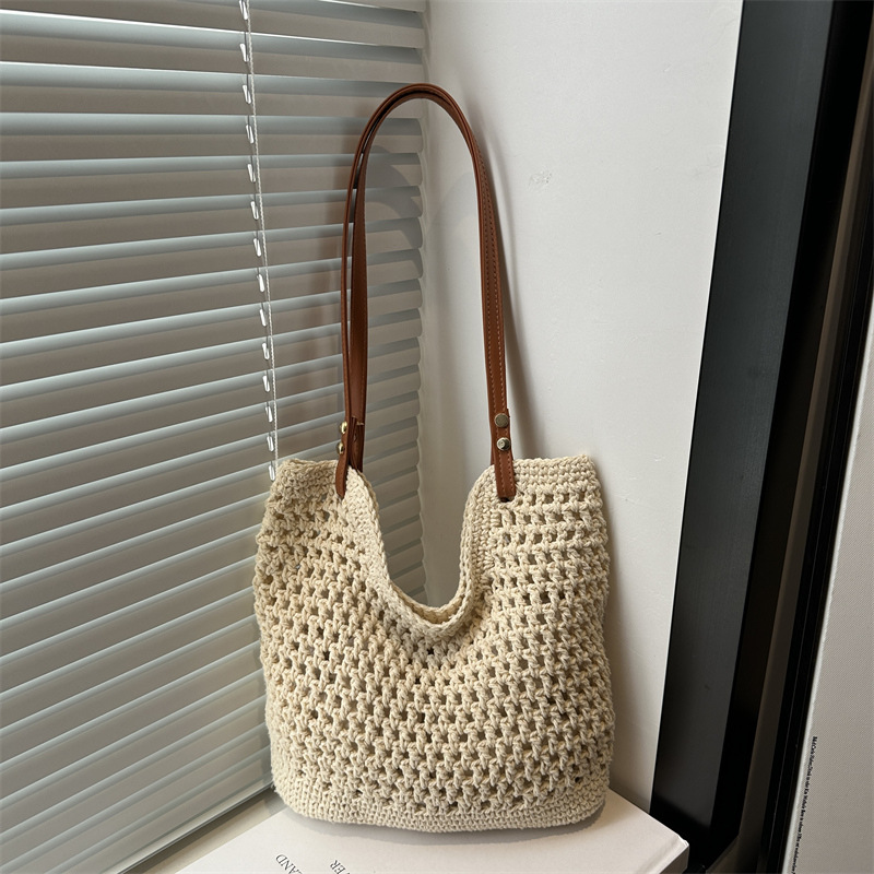 Summer new hollowed-out bucket bag for women, large-capacity summer casual and versatile woven crossbody single-shoulder bag full figure
