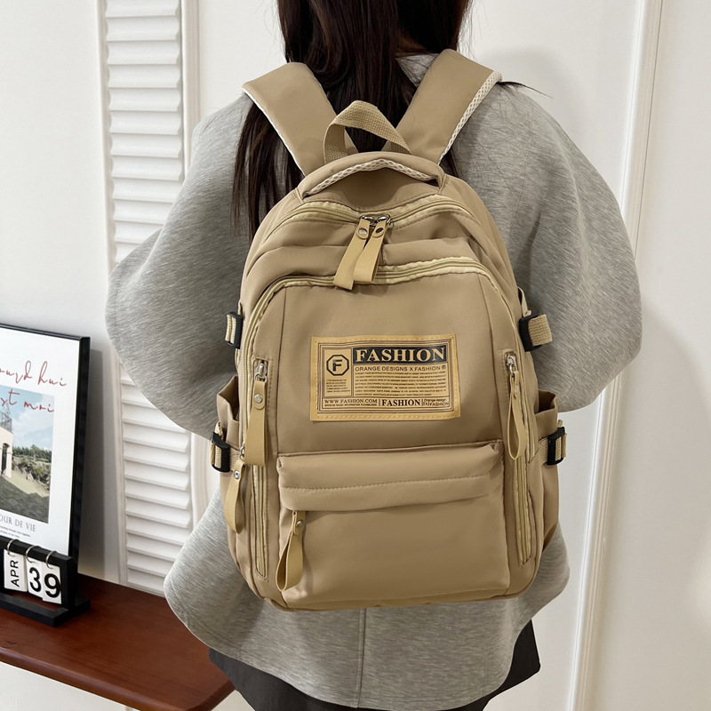 2025 New model of backpack for junior and senior high school students, schoolbag for female college students, large-capacity, multi-functional, casual and outdoor backpack Specification drawing