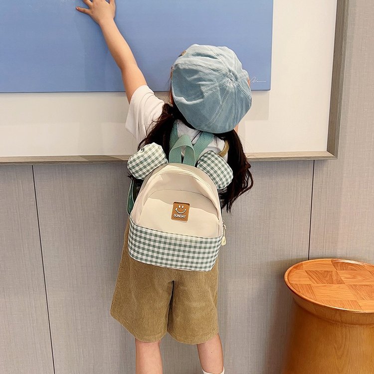 New Korean version double-shoulder children's bags for autumn and winter 2023, fashionable color-blocking cute backpacks for boys and girls, small schoolbags details Picture