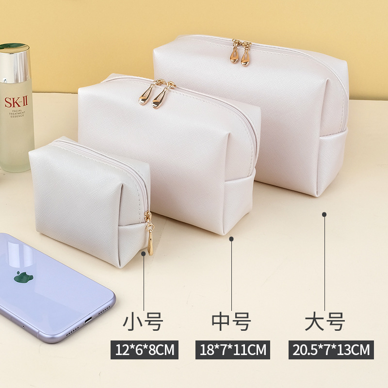Wholesale of best-selling PU small-sized hand-held cosmetic bags, portable women's travel toiletry bags and cosmetic storage bags for foreign trade details Picture