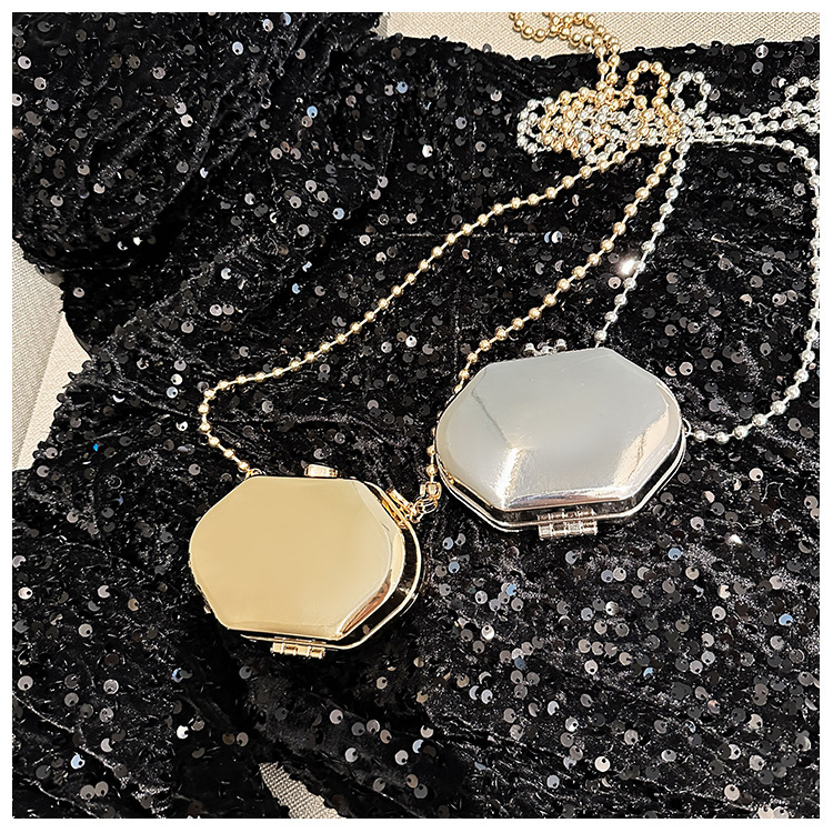 2025 New cross-border metal mini bag, zinc alloy small round bag, single-shoulder crossbody fashionable mouth red envelope makeup small bag details Picture