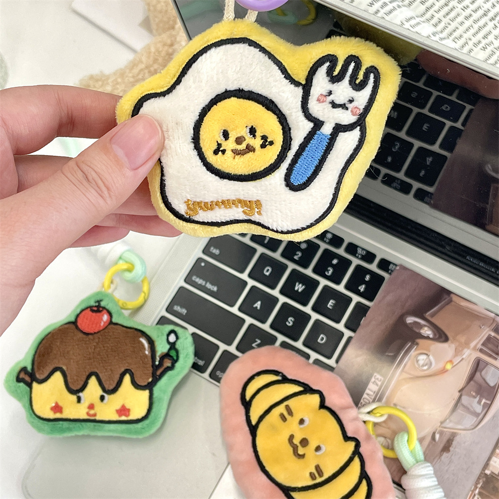 L51142 Cartoon gift decoration Pendant, cotton-filled bag pendant, embroidered small doll, car doll, keychain Application Scenario