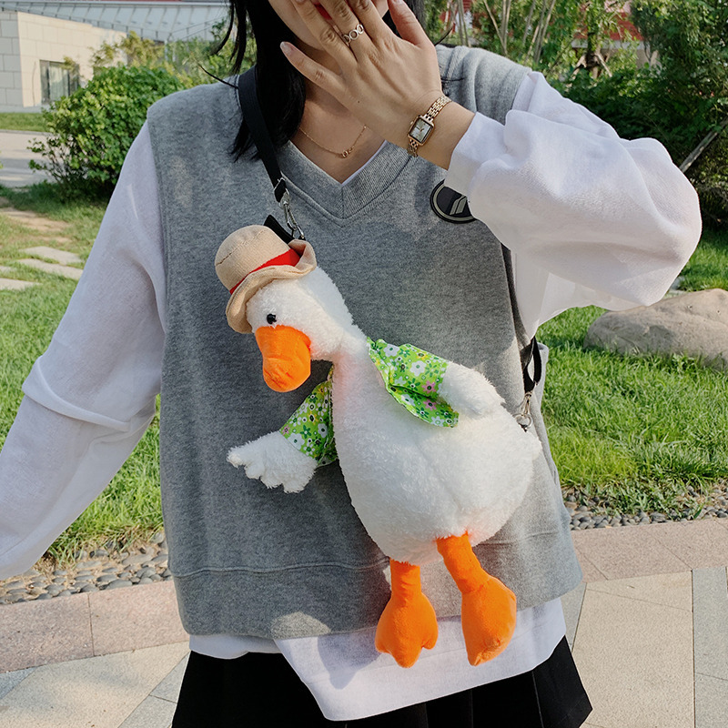 Cute and ugly duck-shaped plush toy in a vest, an Instagram influencer straw hat doll, and a birthday gift for the "Cheer Up Duck Girl" details Picture