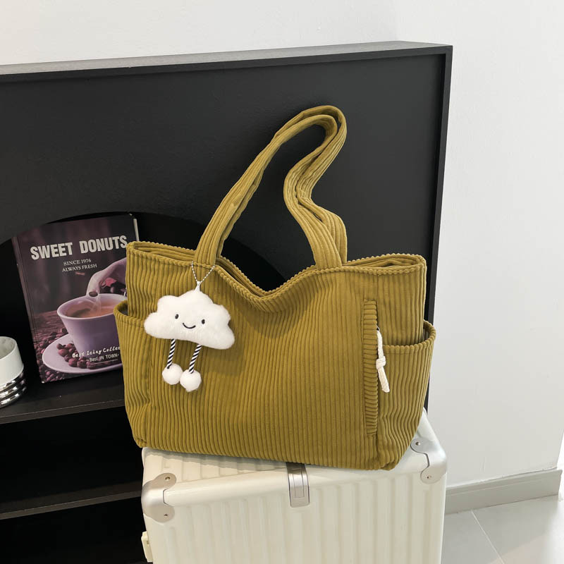 New large-capacity commuter tote bag, personalized student schoolbag, simple solid-color pleated single-shoulder bag full figure
