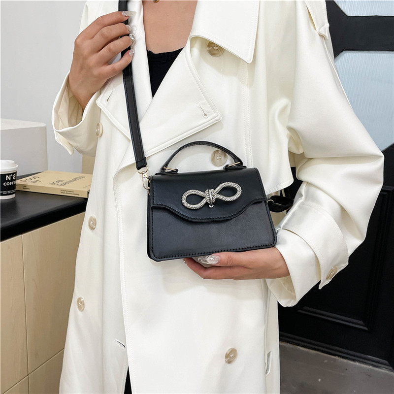 A stylish Korean-style simple solid color bow with stitching, casual and casual, crossbody single-shoulder hand-held small square women's bag Specification drawing