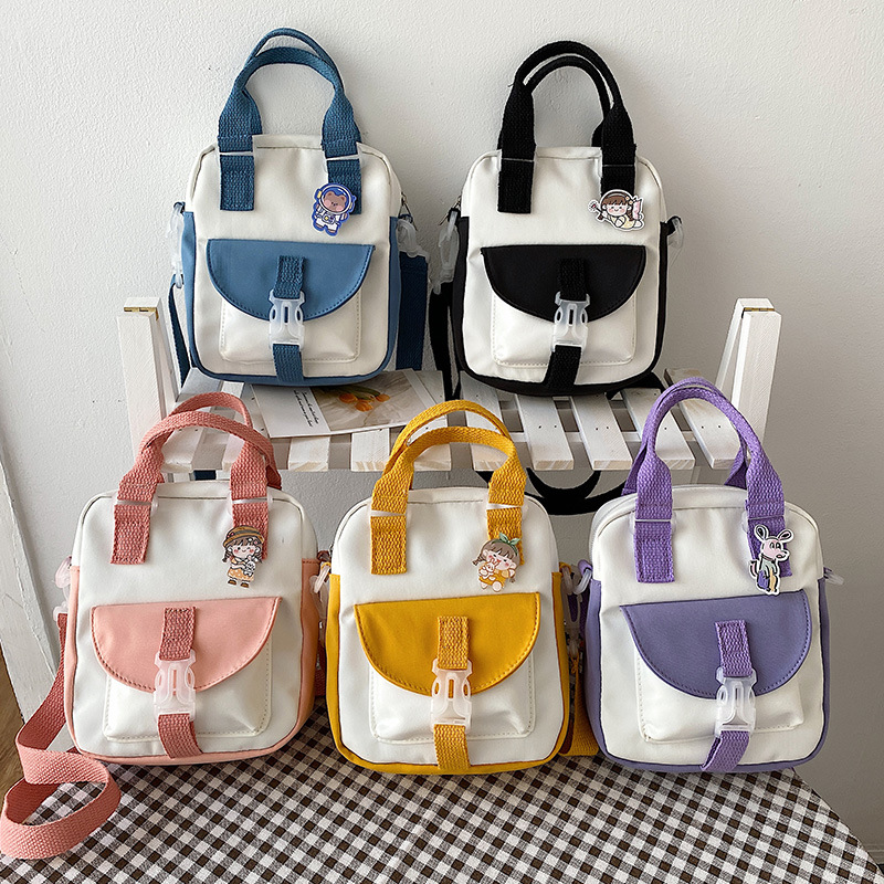 Korean style fashionable color-blocking hand-held small bag for women, 2021 new trendy single-shoulder crossbody women's bag, simple and individual small cloth bag full figure