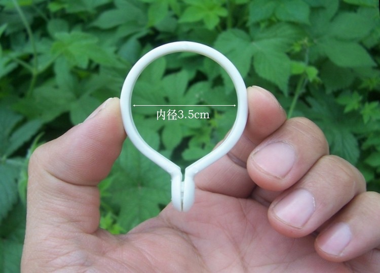 Curtain opening rings, live opening lifting rings, pull rings, slip rings, deformable curtain rings, Roman rings, white plastic material accessories details Picture
