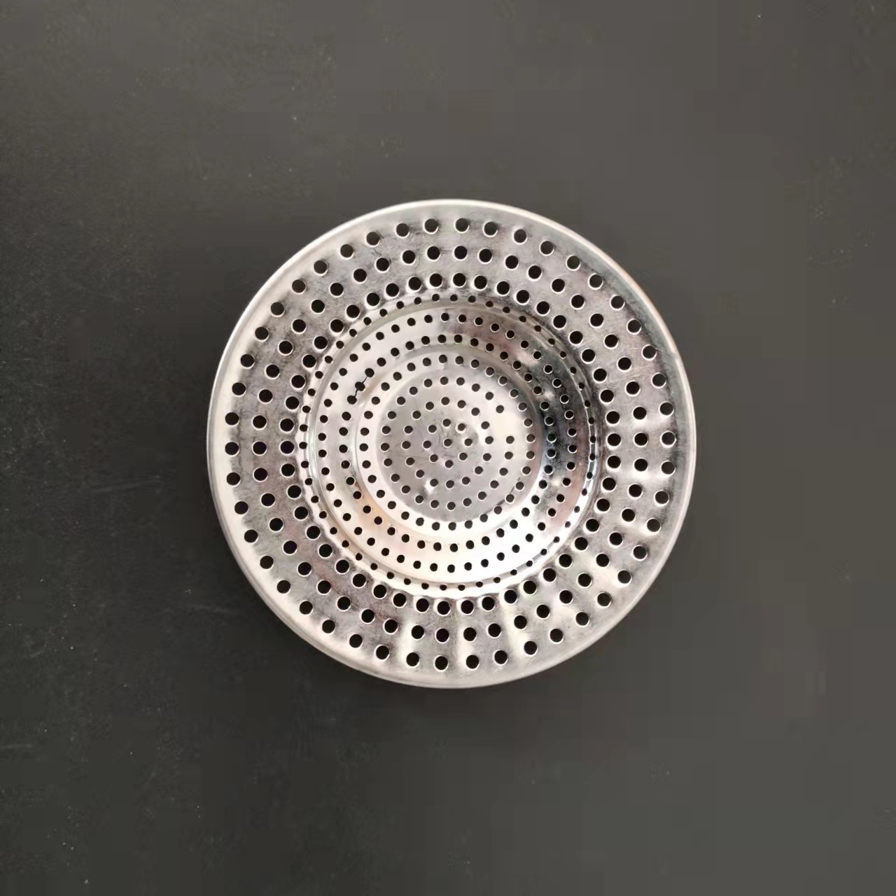Fully perforated one-piece formed stainless steel bathroom drain filter screen, bathroom sewer hair floor filter screen Application Scenario