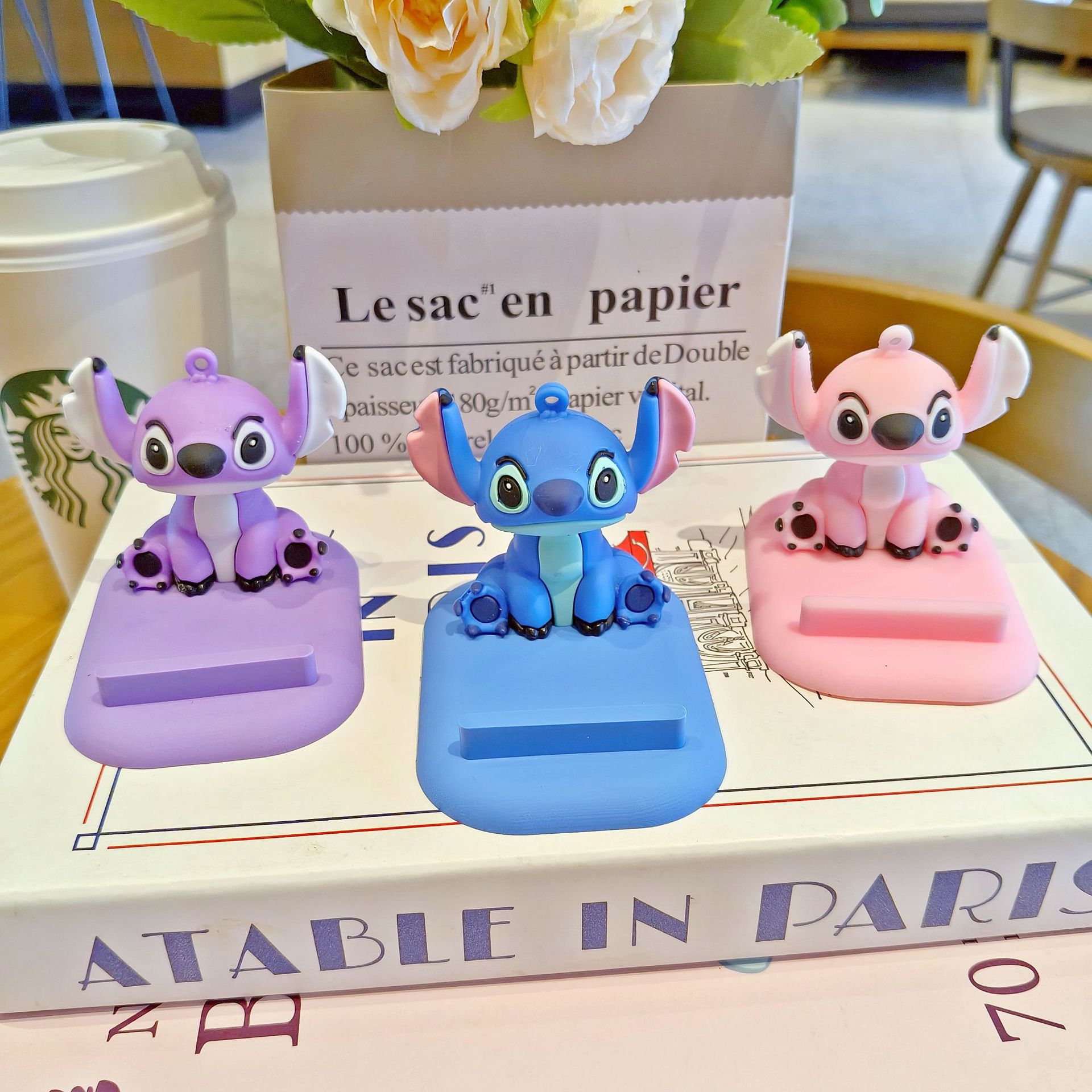 Wholesale of new cute desktop cartoon figurines, cartoon lazy phone stands, claw machines and blind box gifts from Stitch full figure