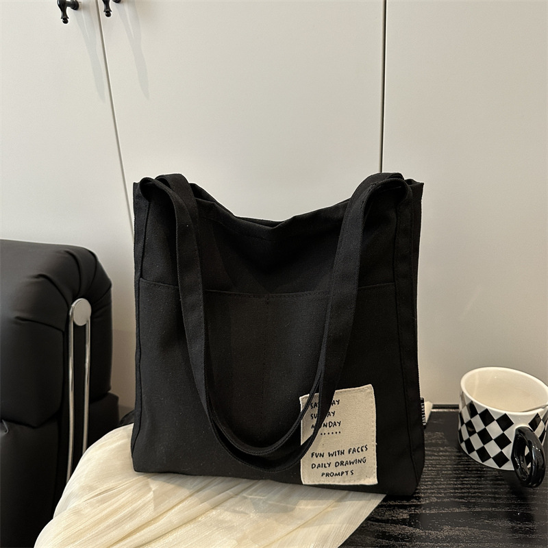 Crossbody women's bag 2025 new style casual canvas single-shoulder bag Cross-border trend Student tutorial bag large capacity tote bag full figure