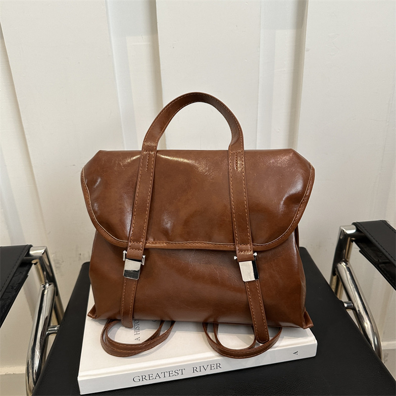Large-capacity winter artistic commuting retro backpack 2024, simple and casual pendant, multi-functional new tote bag full figure