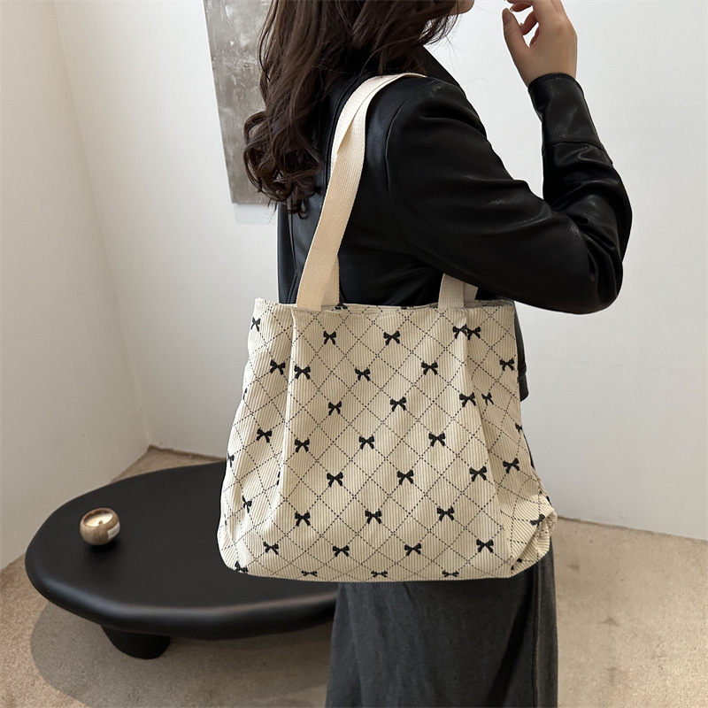 2024 New underarm bag, corduroy butterfly print, fashionable and casual single-shoulder bag, hand-held large-capacity tote bag for women details Picture