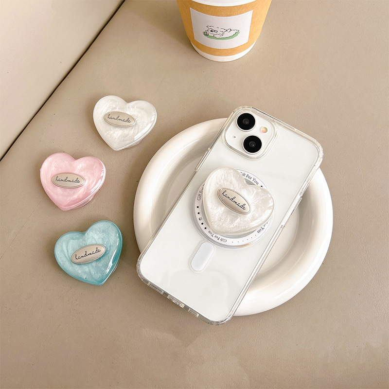 Colorful heart-shaped phone airbag stand, English light luxury ins style, high-end magnetic back sticker, desktop TV watching stand Application Scenario
