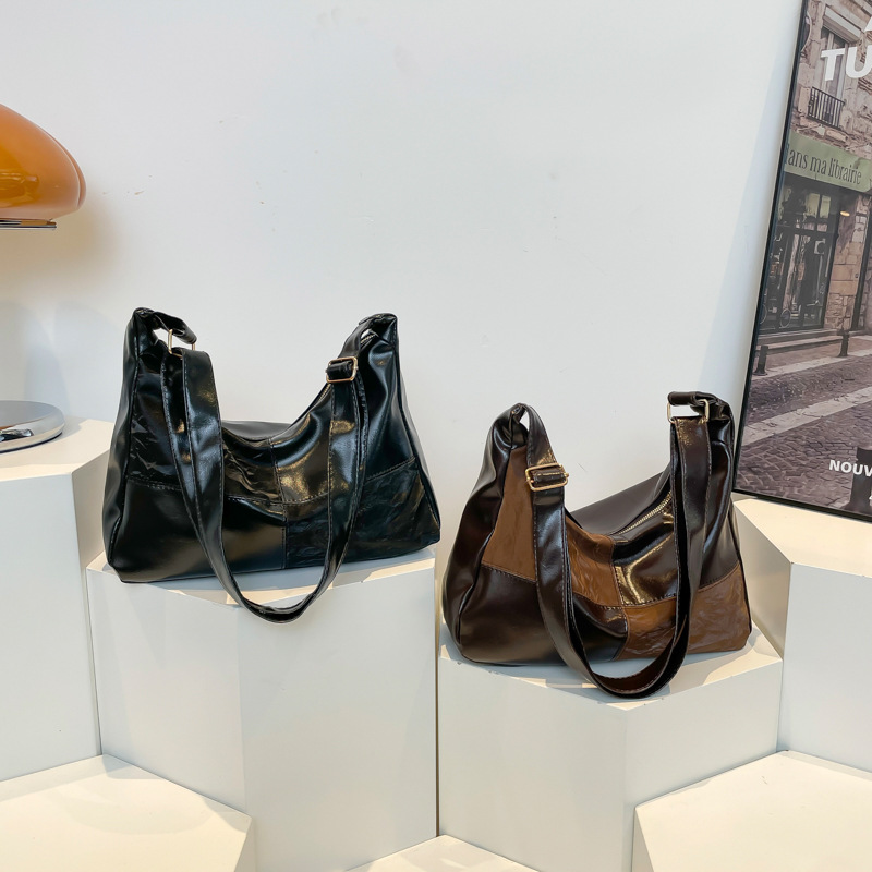 The 2024 new model features a niche design with contrasting colors, a hand-held retro single-shoulder crossbody bag with a high-quality commuting underarm Application Scenario