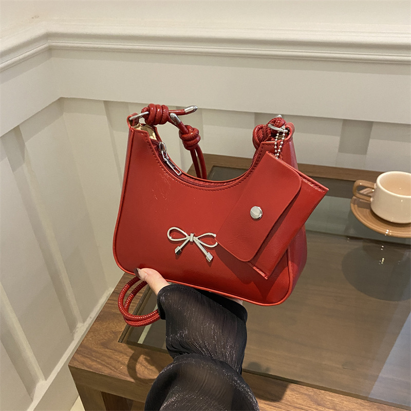 Bow underarm bag for women, 2024 new style simple commuter bucket bag, high-end texture, single-shoulder crossbody bag, trendy full figure