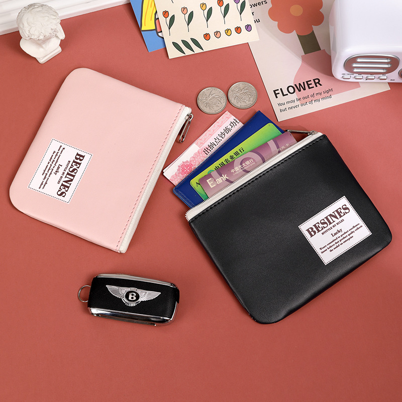 A mini student coin purse with a soft leather feel, key, hand-held bag, simple, thin and small Korean version details Picture