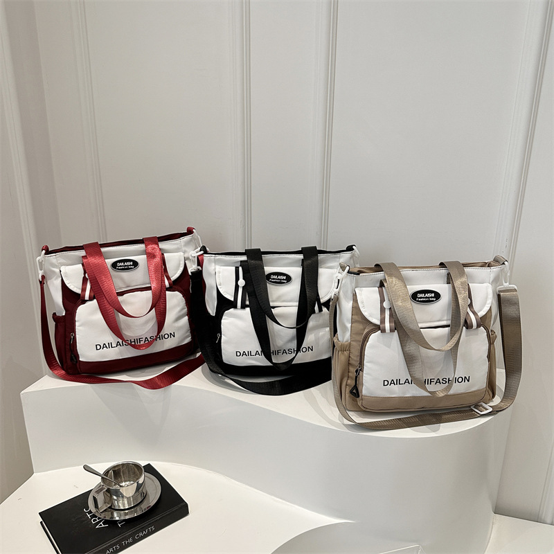 Japanese-style color-blocking students carry multi-pocket canvas crossbody bags for tutoring and large-capacity single-shoulder girls' bags for classes Application Scenario