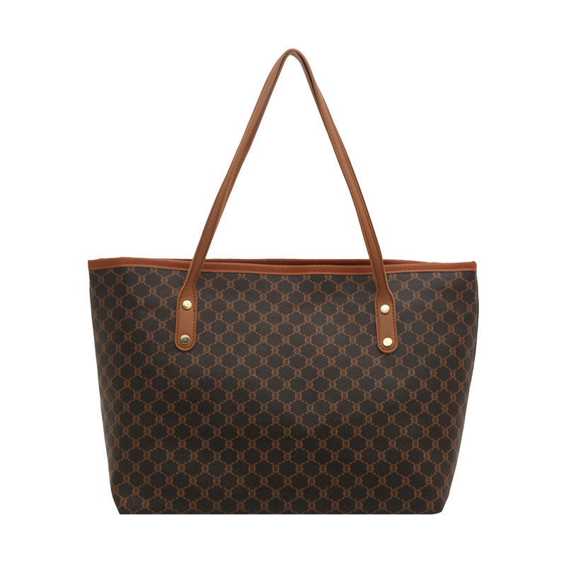 High-end large-capacity bag 2025 new style, niche and versatile commuting bag, trendy mother and child bag, hand-held tote bag for women Item Picture