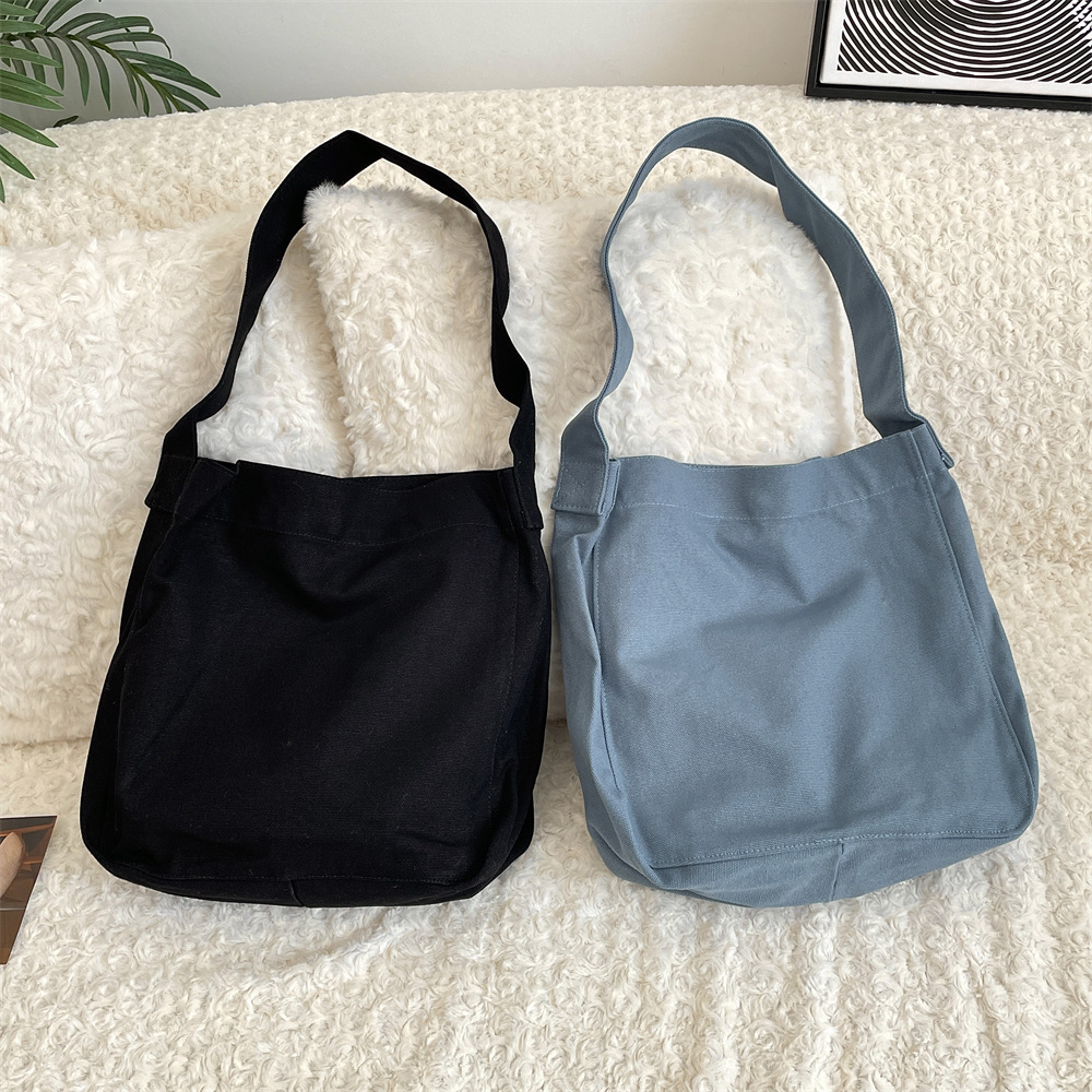Y33 solid color large-capacity 16-ampere canvas bag, large-capacity single-shoulder bag, shopping bag, versatile for commuting, casual bag for women Application Scenario