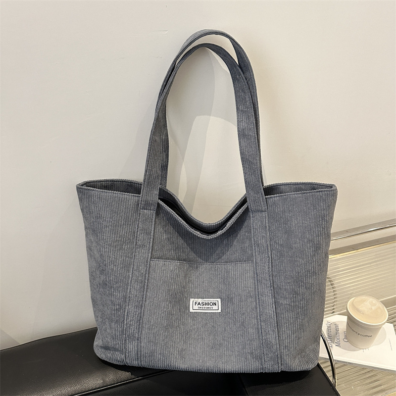 Large-capacity corduroy fabric bag for women, 2024 new style college student single-shoulder hand-carry large bag, commuter bag, tote bag full figure