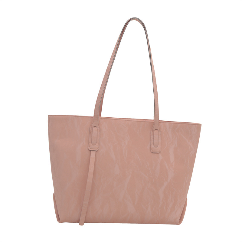 The new large-capacity solid-color autumn 2024 collection features a fashionable, retro and simple women's single-shoulder underarm commuter tote bag Item Picture