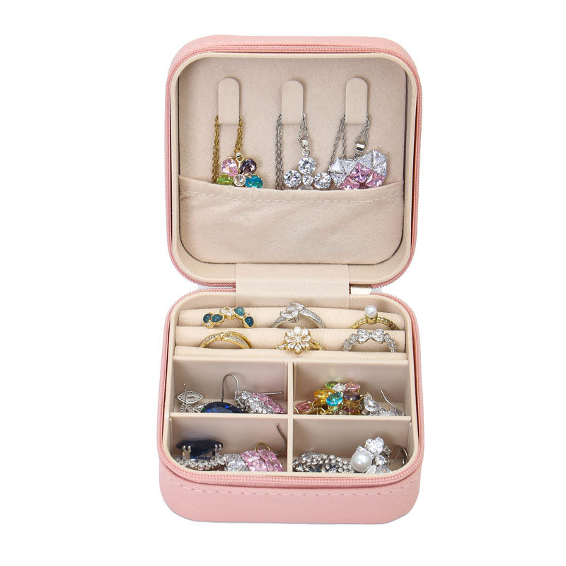 The new portable jewelry box exudes a sweet and high-end charm. It features jewelry, necklaces, rings, earrings, stud accessories, and is suitable for home storage and cross-border use Item Picture