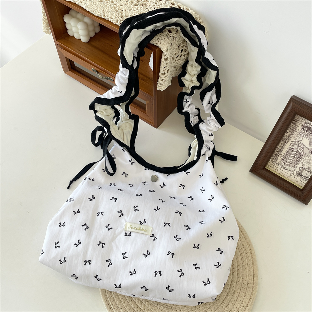 53224 Taro purple bow pleated shoulder strap ethereal single-shoulder crossbody tote bag for women, large capacity canvas bag Application Scenario