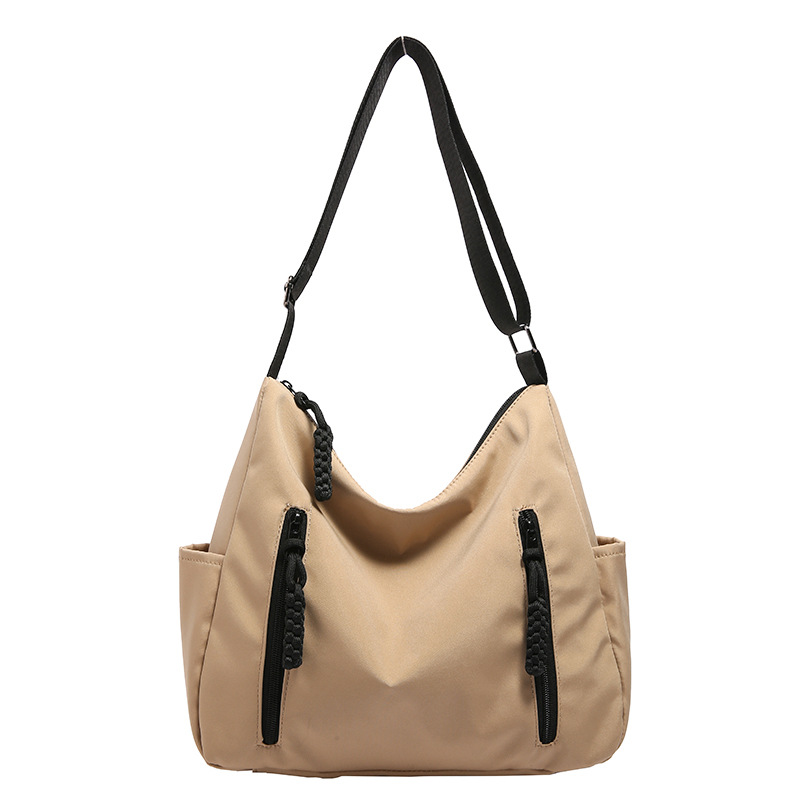 The large-capacity dumpling bag of the trendy brand is selling well across borders. The personalized and fashionable single-shoulder bag is a Korean-style casual and stylish crossbody bag Item Picture