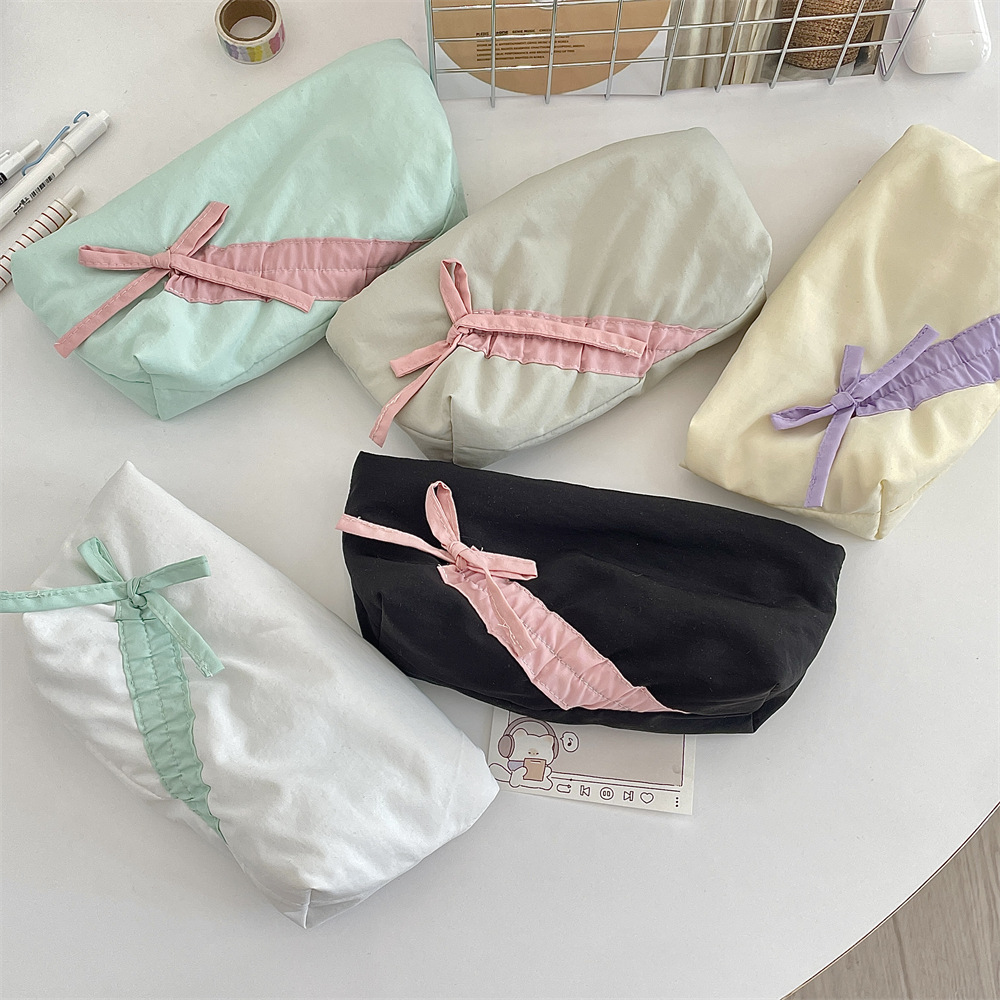 52162 Soft and fluffy fabric pen case, bow storage bag, stationery box, student high appearance level pen case, pencil case Application Scenario
