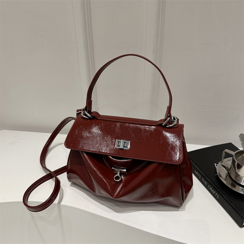 A new, stylish, laid-back and casual solid color 2024 retro and stylish large-capacity hand-held shoulder crossbody women's bag full figure