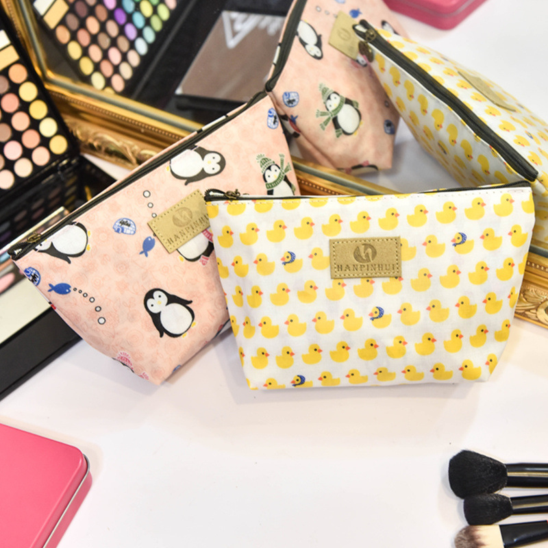 Wholesale of portable, versatile hand-held bags, cute girls' toiletry bags, large-capacity high-end cosmetics storage bags details Picture