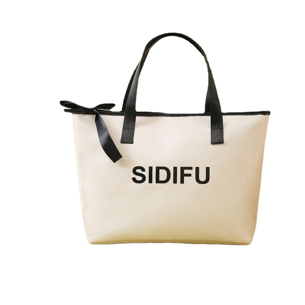 Commuting business bag, large-capacity makeup bag, mommy bag, portable handbag, new luggage storage bag, shopping bag Item Picture
