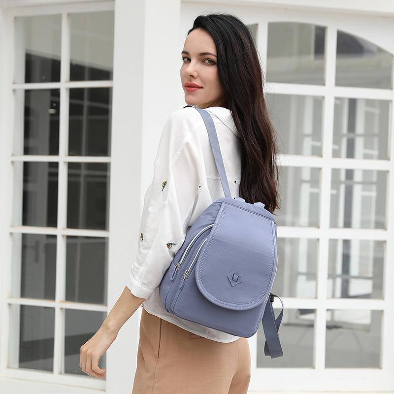 Factory direct sales of new multi-layer backpacks for women, large-capacity, personalized and simple backpacks, fashionable and portable schoolbags from Europe and America details Picture