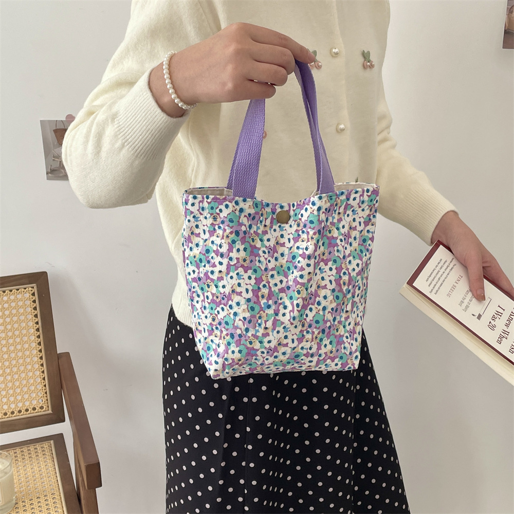 411291 autumn and winter retro casual bento bag, hand-held bag, small cloth bag for work sundries, women's portable handbag Application Scenario