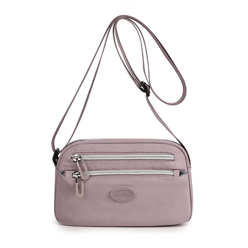 Wholesale of new women's single-shoulder bags, European and American fashion trend crossbody bags, light and simple mobile phone bags, and tree branch pattern backpacks Item Picture