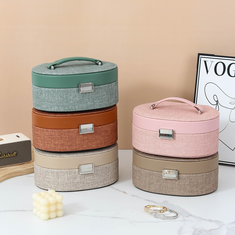 Hand-held semi-circular portable jewelry storage box, double-layer locked ring, fabric pattern jewelry box, simple makeup storage, cross-border Specification drawing