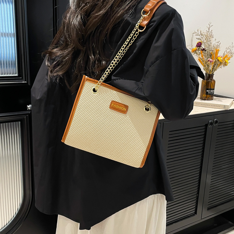 Large-capacity hand-held women's bag 2025 new style trendy color-blocking tote bag, daily commuting single-shoulder crossbody bag for work details Picture