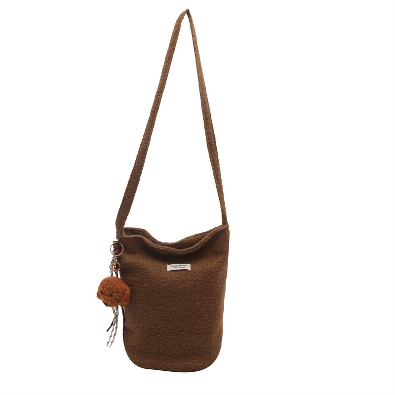 This is a new 2024 autumn collection of Korean-style, fresh and retro bucket bag with a unique, trendy and niche design. It is a single-shoulder crossbody bag Item Picture