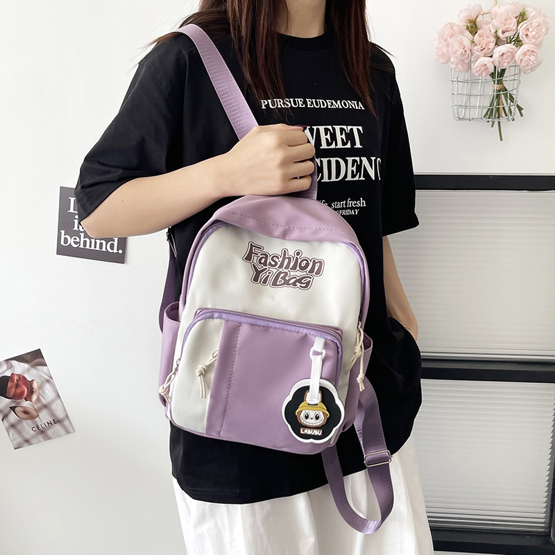 A new large-capacity, simple, fashionable and versatile backpack for junior high school, senior high school and college students in the Korean style of Instagram details Picture
