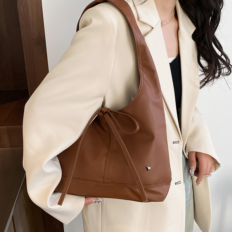 2025 Korean version niche commuter women's bag, versatile and casual bag style bow, large capacity single-shoulder underarm tote bag details Picture