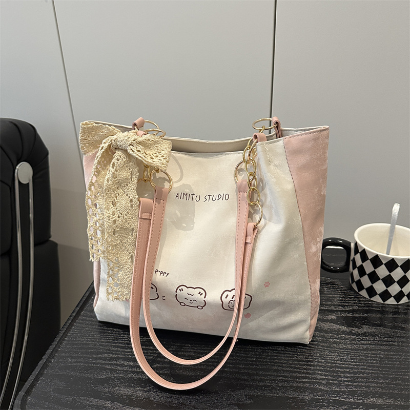 2025 New cute, stylish, trendy, simple and commuting texture printed single-shoulder underarm tote women's bag full figure